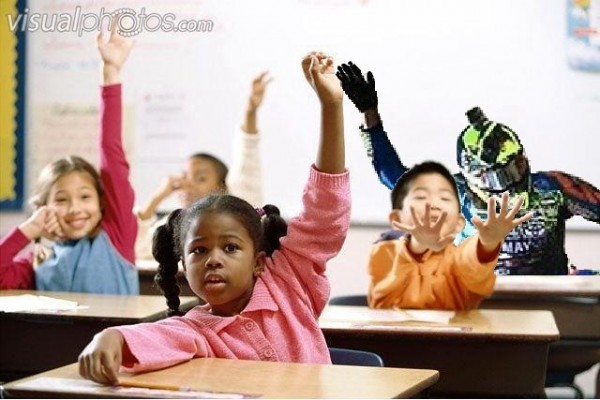 s1200_school_children_raising_their_hands_in_class_1574R_08423B